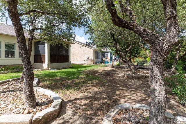12610 Lotus Rdg, San Antonio, TX 78253 - view of yard with a sunroom