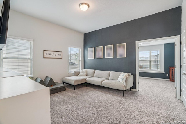 4931 Ranahan Pass, Saint Hedwig, TX 78152 - living area with carpet floors and healthy amount of natural light