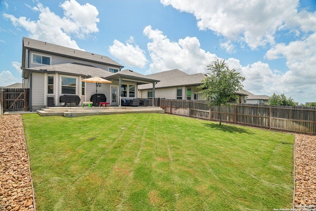 4931 Ranahan Pass, Saint Hedwig, TX 78152 - back of house with a patio area and a fenced backyard