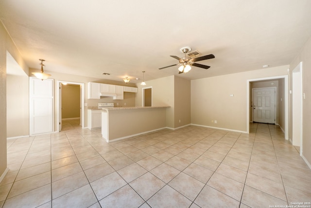 4938 Fairford, San Antonio, TX 78228 - unfurnished living room featuring light tile patterned floors and ceiling fan