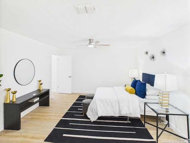 7007 Elk Trl, San Antonio, TX 78244 - bedroom with light wood-style flooring and a ceiling fan