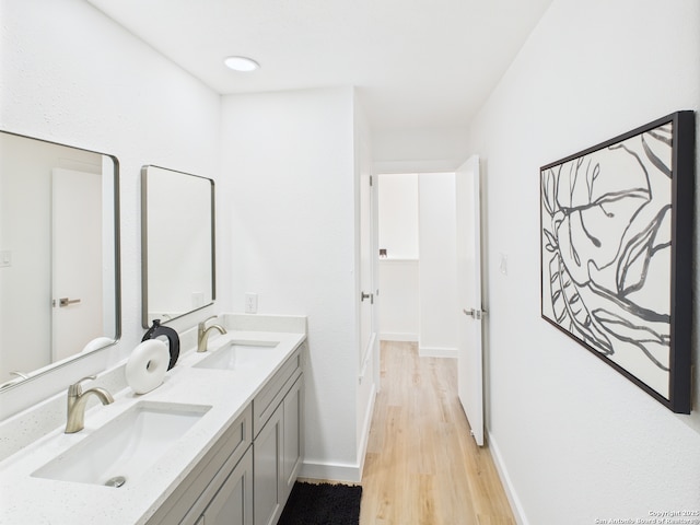 7007 Elk Trl, San Antonio, TX 78244 - full bath with wood finished floors and double vanity