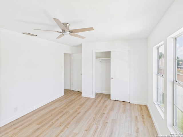 7007 Elk Trl, San Antonio, TX 78244 - unfurnished bedroom featuring wood finished floors, a closet, and ceiling fan