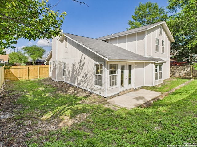 7007 Elk Trl, San Antonio, TX 78244 - back of house featuring a fenced backyard, a patio area, and french doors