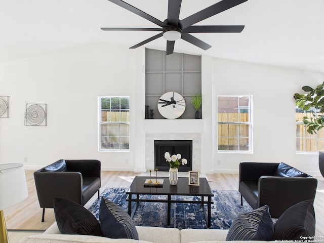 7007 Elk Trl, San Antonio, TX 78244 - living room with ceiling fan, wood finished floors, a premium fireplace, and high vaulted ceiling