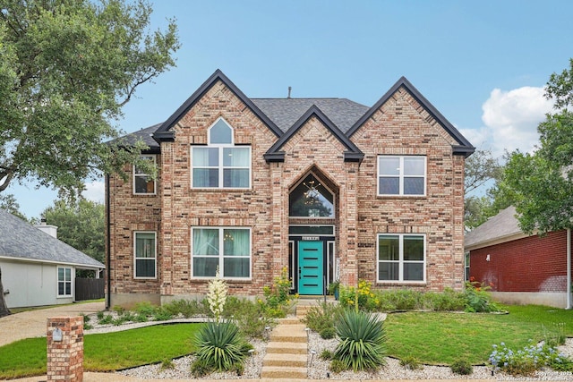 1159 Bluff Frst, San Antonio, TX 78248 - view of front facade featuring brick siding and a front lawn