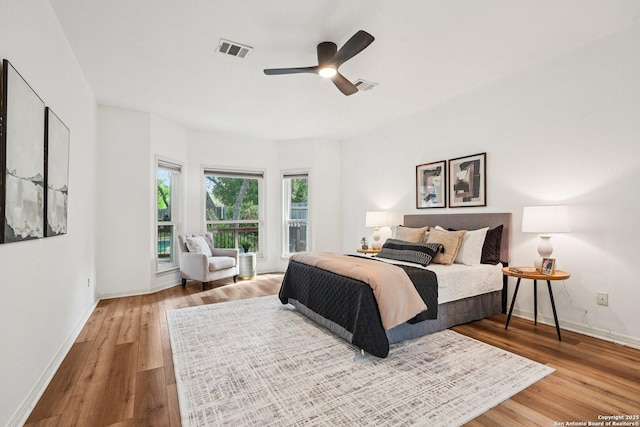 1159 Bluff Frst, San Antonio, TX 78248 - bedroom featuring wood finished floors and ceiling fan