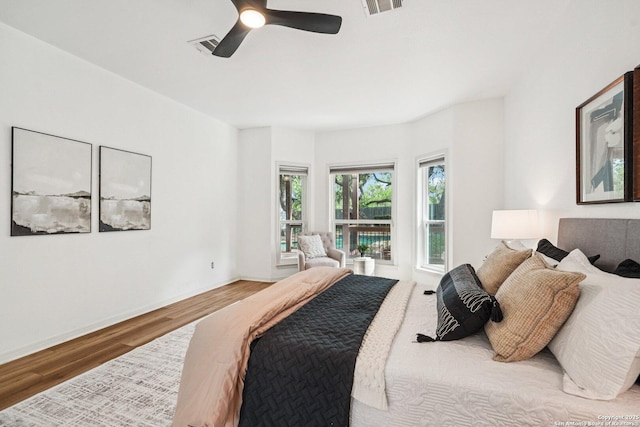 1159 Bluff Frst, San Antonio, TX 78248 - bedroom with wood finished floors and ceiling fan