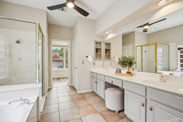 1159 Bluff Frst, San Antonio, TX 78248 - full bathroom featuring ceiling fan, a stall shower, double vanity, a garden tub, and recessed lighting