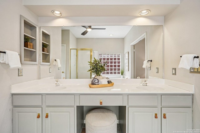 1159 Bluff Frst, San Antonio, TX 78248 - bathroom with a stall shower, double vanity, ceiling fan, and recessed lighting