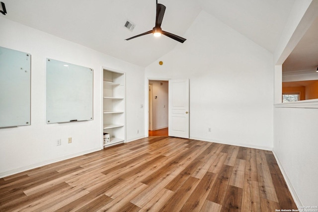 1159 Bluff Frst, San Antonio, TX 78248 - spare room with built in features, wood finished floors, ceiling fan, and high vaulted ceiling