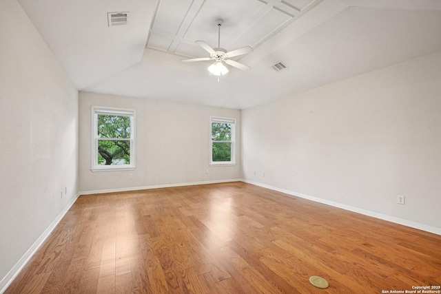 1159 Bluff Frst, San Antonio, TX 78248 - spare room featuring light wood-style flooring, ceiling fan, and coffered ceiling