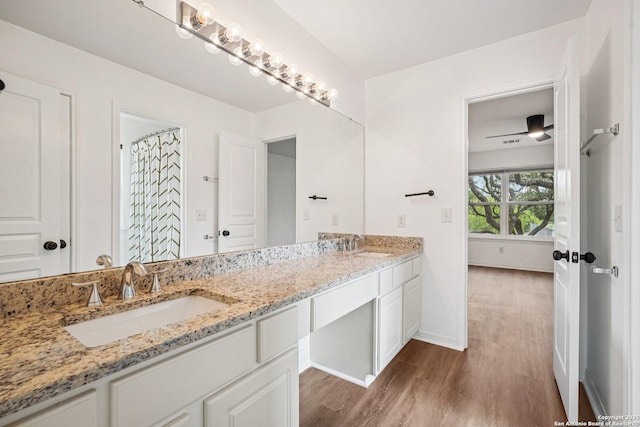 1159 Bluff Frst, San Antonio, TX 78248 - bathroom with double vanity and wood finished floors
