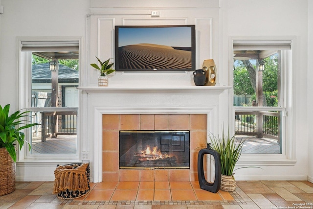 1159 Bluff Frst, San Antonio, TX 78248 - detailed view of a tile fireplace and baseboards