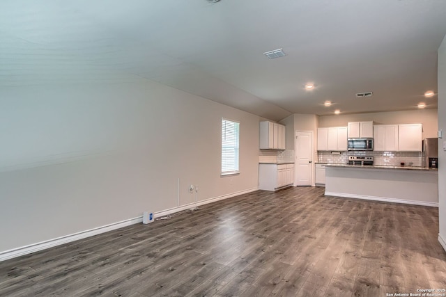 3008 Pemberton Post, San Antonio, TX 78245 - unfurnished living room featuring dark wood-style flooring and recessed lighting