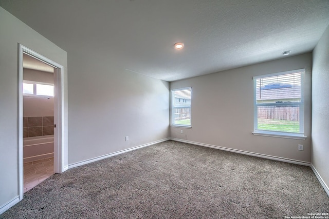 3008 Pemberton Post, San Antonio, TX 78245 - unfurnished room featuring carpet, plenty of natural light, and recessed lighting