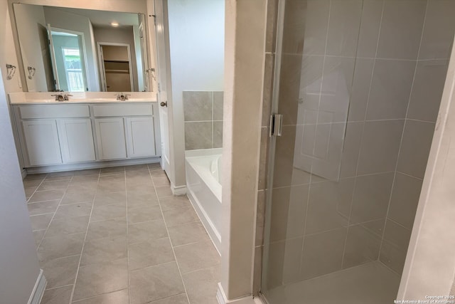 3008 Pemberton Post, San Antonio, TX 78245 - full bath with a shower stall, double vanity, a bath, and tile patterned flooring