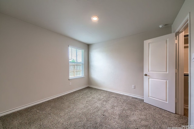 3008 Pemberton Post, San Antonio, TX 78245 - carpeted spare room featuring a smoke detector and baseboards