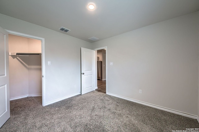 3008 Pemberton Post, San Antonio, TX 78245 - unfurnished bedroom featuring carpet floors, a spacious closet, and a closet