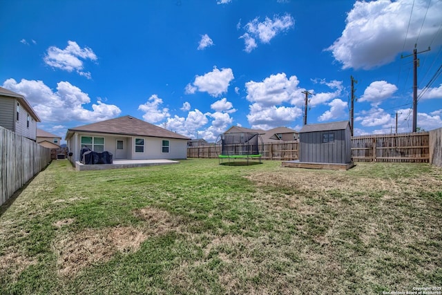 3008 Pemberton Post, San Antonio, TX 78245 - fenced backyard featuring a trampoline, a shed, and a patio
