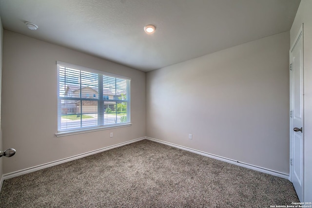 3008 Pemberton Post, San Antonio, TX 78245 - carpeted spare room featuring baseboards and a smoke detector