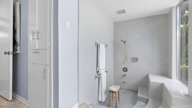 1318 Mount Vieja, San Antonio, TX 78213 - bathroom featuring tiled shower and baseboards