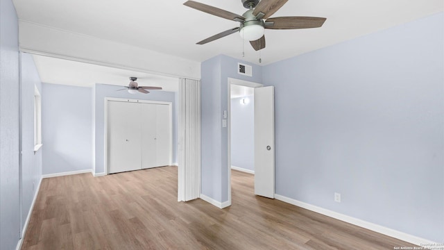 1318 Mount Vieja, San Antonio, TX 78213 - unfurnished bedroom featuring wood finished floors, a closet, and a ceiling fan