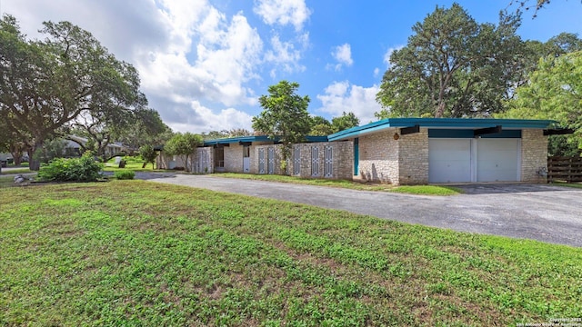 1318 Mount Vieja, San Antonio, TX 78213 - mid-century inspired home with driveway, stone siding, and an attached garage