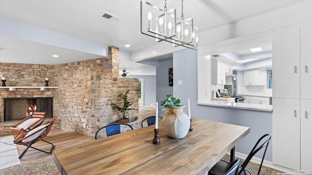 1318 Mount Vieja, San Antonio, TX 78213 - dining area featuring a fireplace and recessed lighting