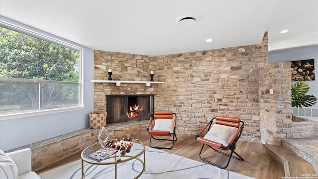 1318 Mount Vieja, San Antonio, TX 78213 - living area with wood finished floors, a large fireplace, and healthy amount of natural light