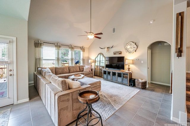 13942 Evelina, San Antonio, TX 78253 - tiled living area with arched walkways, ceiling fan, healthy amount of natural light, and high vaulted ceiling
