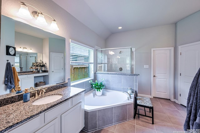 13942 Evelina, San Antonio, TX 78253 - full bathroom featuring a stall shower, vanity, a garden tub, and tile patterned flooring