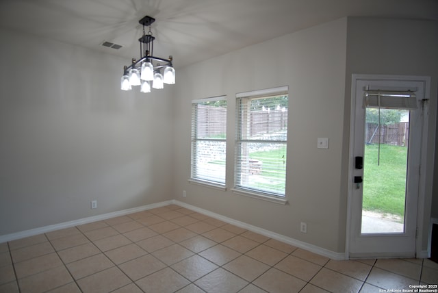 24123 Horse Pr, San Antonio, TX 78261 - unfurnished dining area featuring a chandelier and light tile patterned flooring
