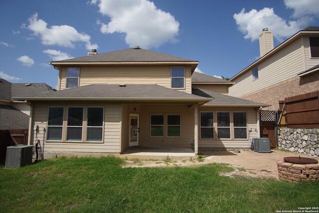 24123 Horse Pr, San Antonio, TX 78261 - rear view of house featuring an outdoor fire pit and a patio area