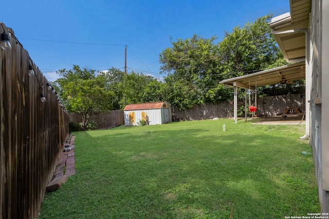 450 Pamela, San Antonio, TX 78223 - fenced backyard featuring a storage unit