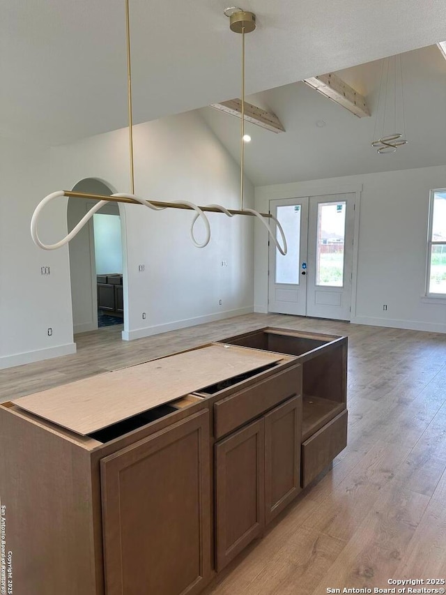 129 Merion Ln, Vernia, TX 78121 - kitchen featuring open floor plan, light wood-style flooring, and french doors