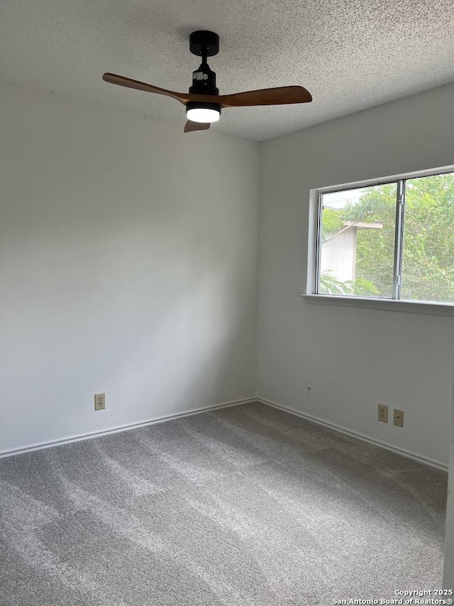 7947 Ruby Mdws, San Antonio, TX 78251 - spare room featuring carpet, ceiling fan, and a textured ceiling