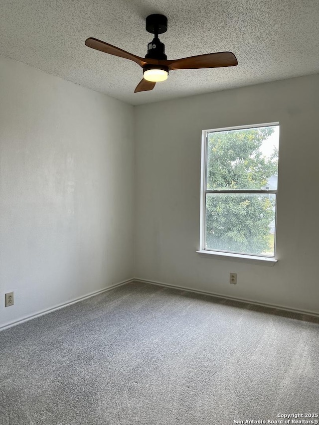 7947 Ruby Mdws, San Antonio, TX 78251 - carpeted spare room featuring plenty of natural light, a ceiling fan, and a textured ceiling