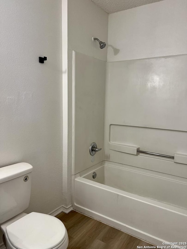 7947 Ruby Mdws, San Antonio, TX 78251 - bathroom featuring wood finished floors and bathtub / shower combination