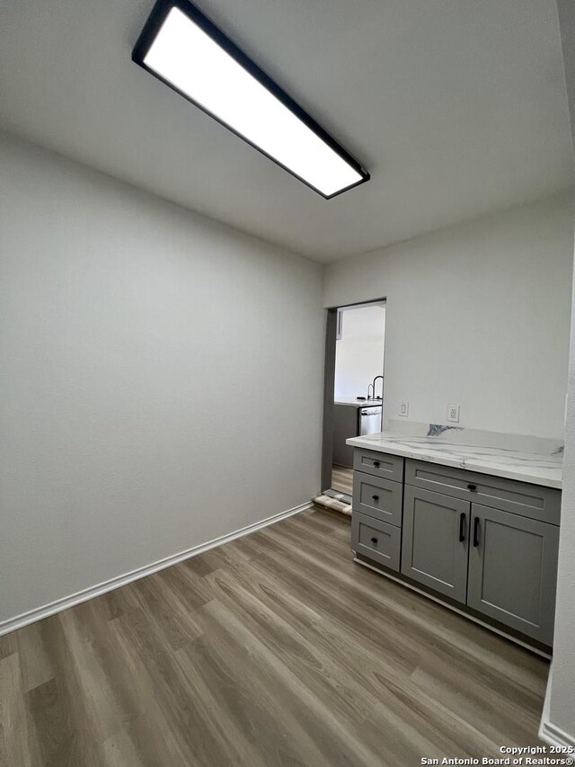 7947 Ruby Mdws, San Antonio, TX 78251 - bar with wood finished floors