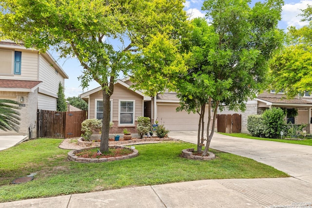 9235 Everton, San Antonio, TX 78245 - view of front facade featuring concrete driveway, brick siding, an attached garage, and a gate