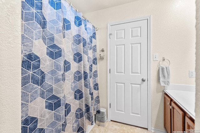 9235 Everton, San Antonio, TX 78245 - bathroom with vanity, tile patterned flooring, and curtained shower