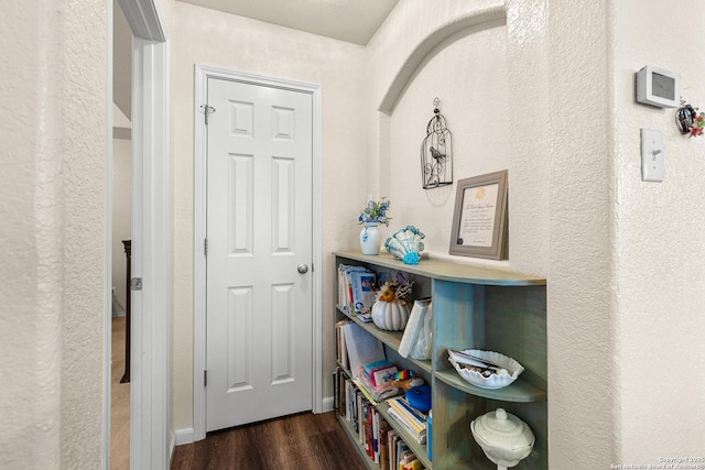 9235 Everton, San Antonio, TX 78245 - hall featuring dark wood-type flooring and a textured wall
