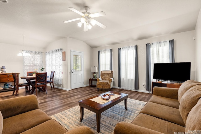 9235 Everton, San Antonio, TX 78245 - living room featuring vaulted ceiling, ceiling fan, and wood finished floors