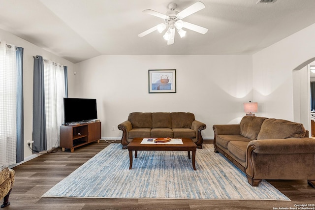 9235 Everton, San Antonio, TX 78245 - living area featuring arched walkways, wood finished floors, ceiling fan, and vaulted ceiling