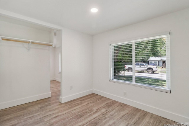 937 Anderson, Seguin, TX 78155 - unfurnished bedroom featuring light wood-style floors and a closet