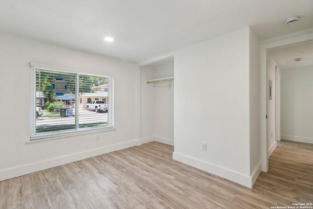 937 Anderson, Seguin, TX 78155 - unfurnished bedroom with wood finished floors, a closet, and recessed lighting