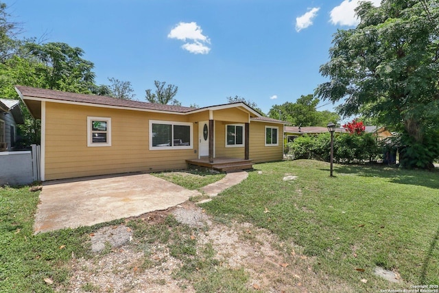 937 Anderson, Seguin, TX 78155 - back of property with a yard and a patio area