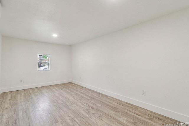 937 Anderson, Seguin, TX 78155 - empty room featuring light wood finished floors and recessed lighting