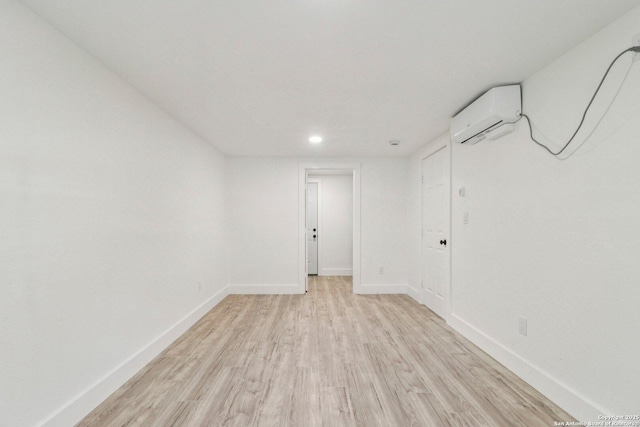 937 Anderson, Seguin, TX 78155 - unfurnished room with a wall mounted AC, light wood-type flooring, and recessed lighting